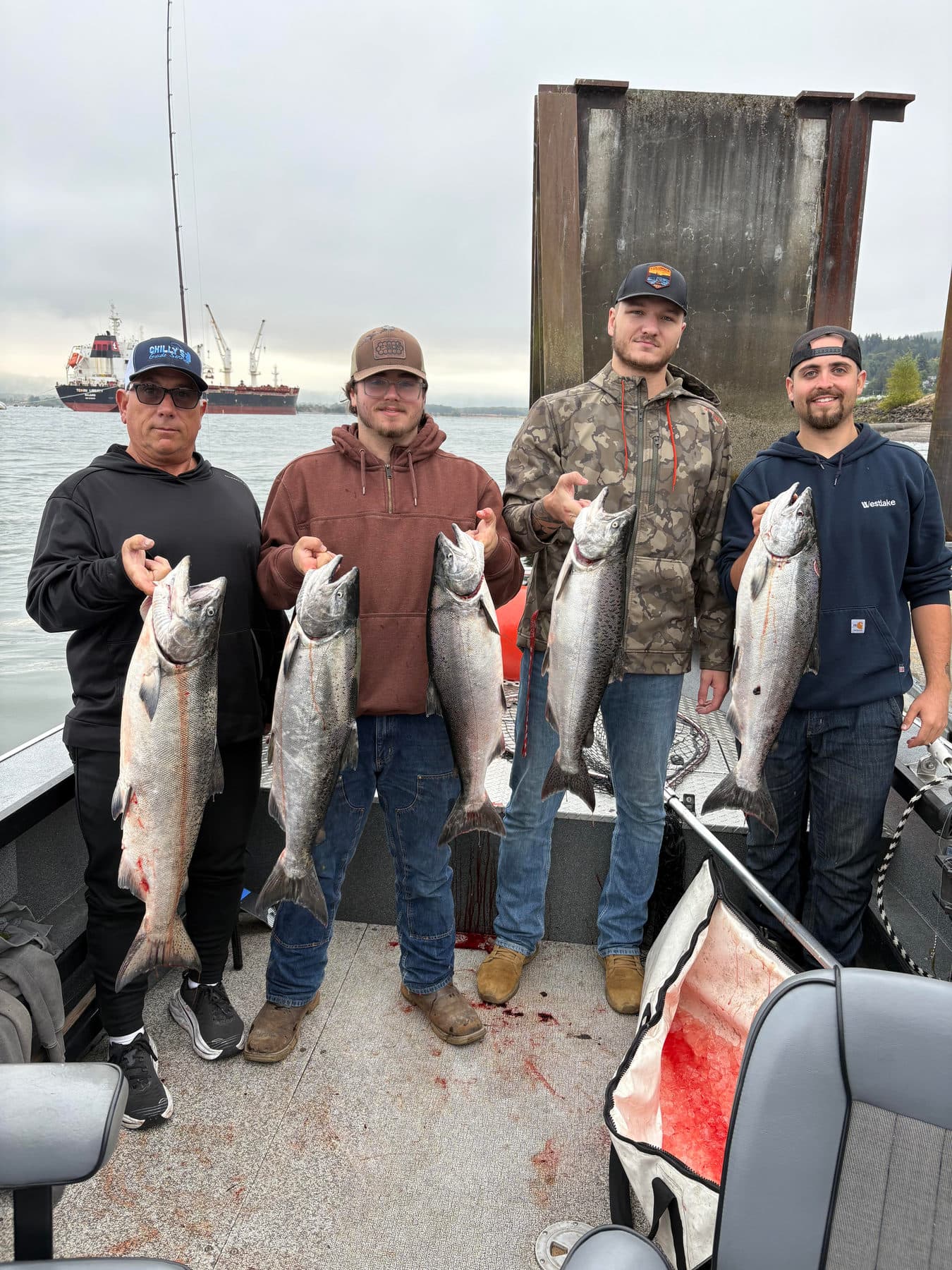 Group of anglers with a limit of salmon on the Columbia River