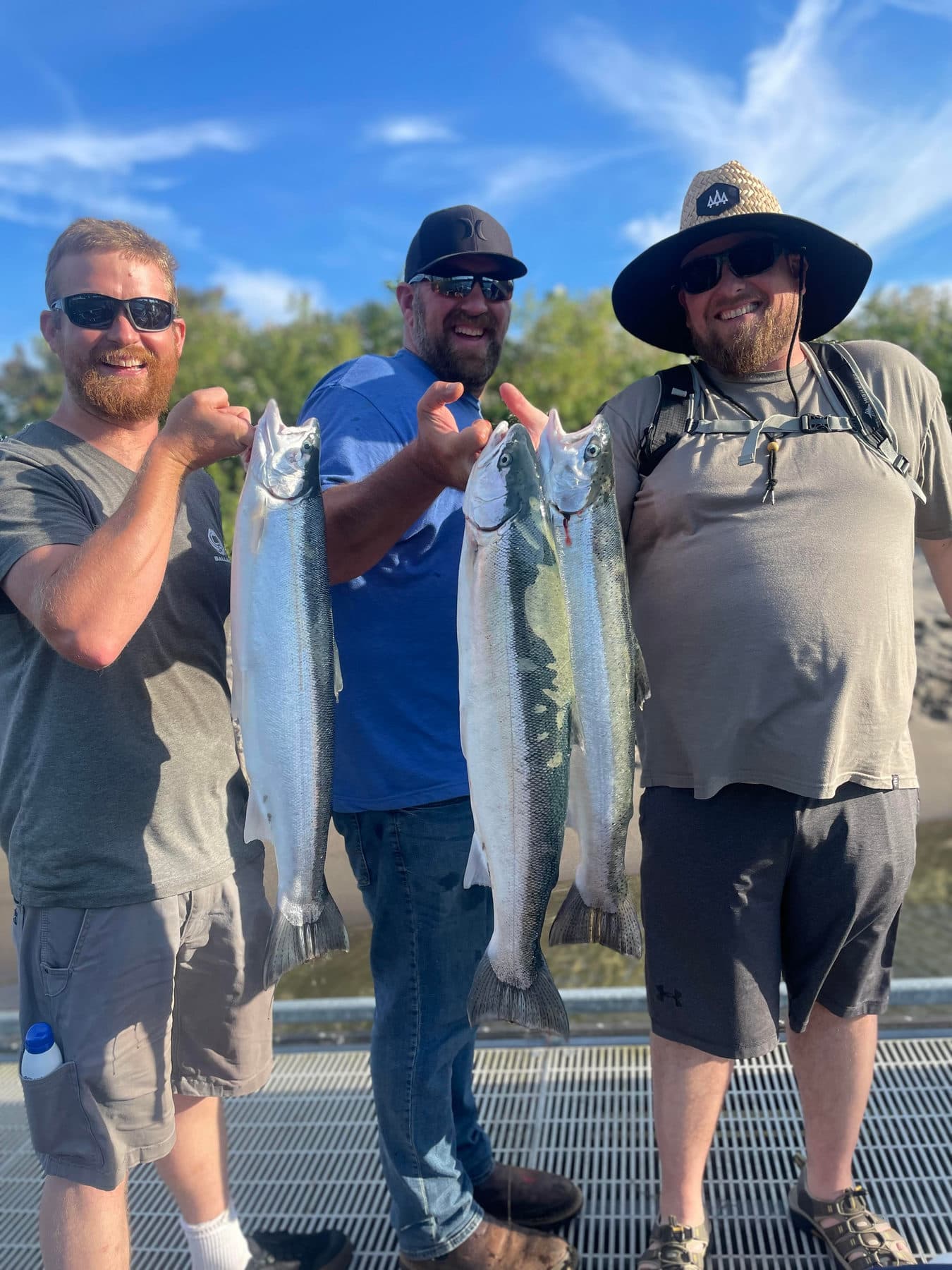 Anglers celebrating a catch on the Columbia River