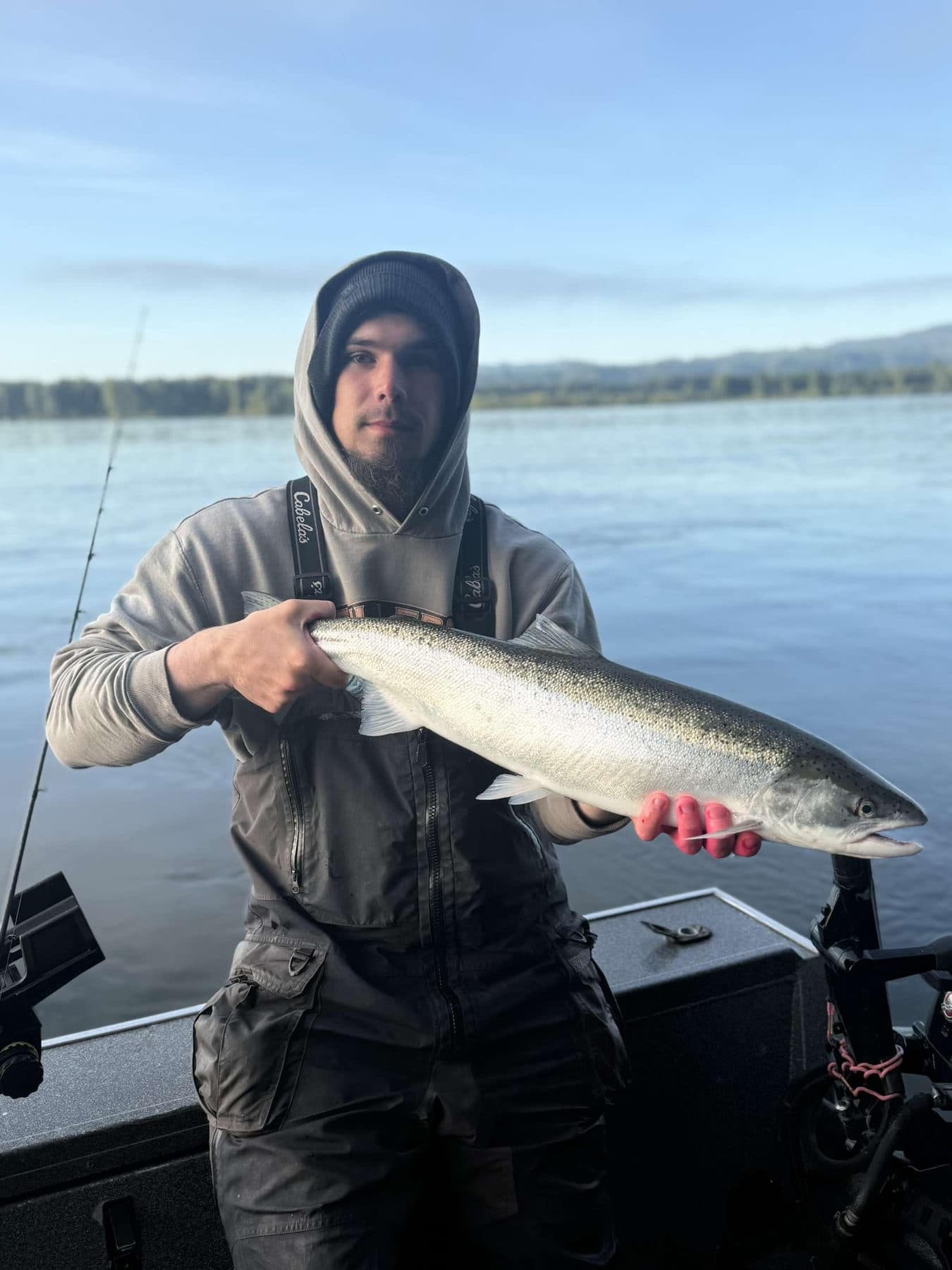 Jacob Childers holding a Columbia River steelhead